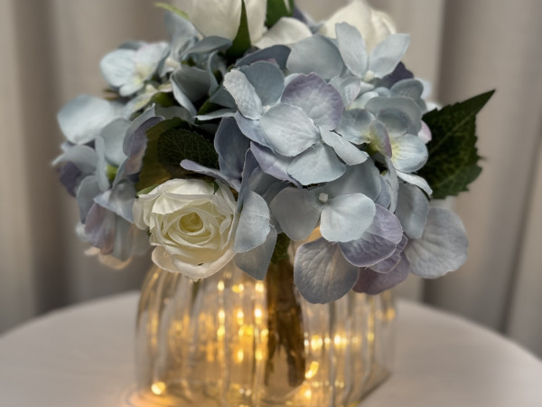 Small Light Blue Hydrangea & White Rose Centrepiece Photo
