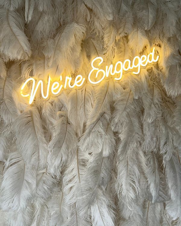 We're Engaged Neon Sign Photo